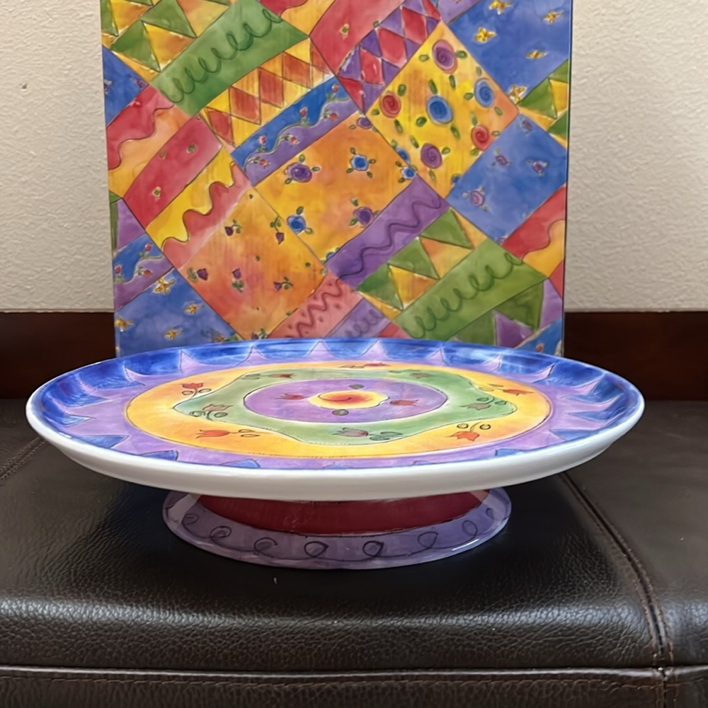 Footed 12” Cake Plate in Ceramic Features The Sweet Shoppe Design by Sango